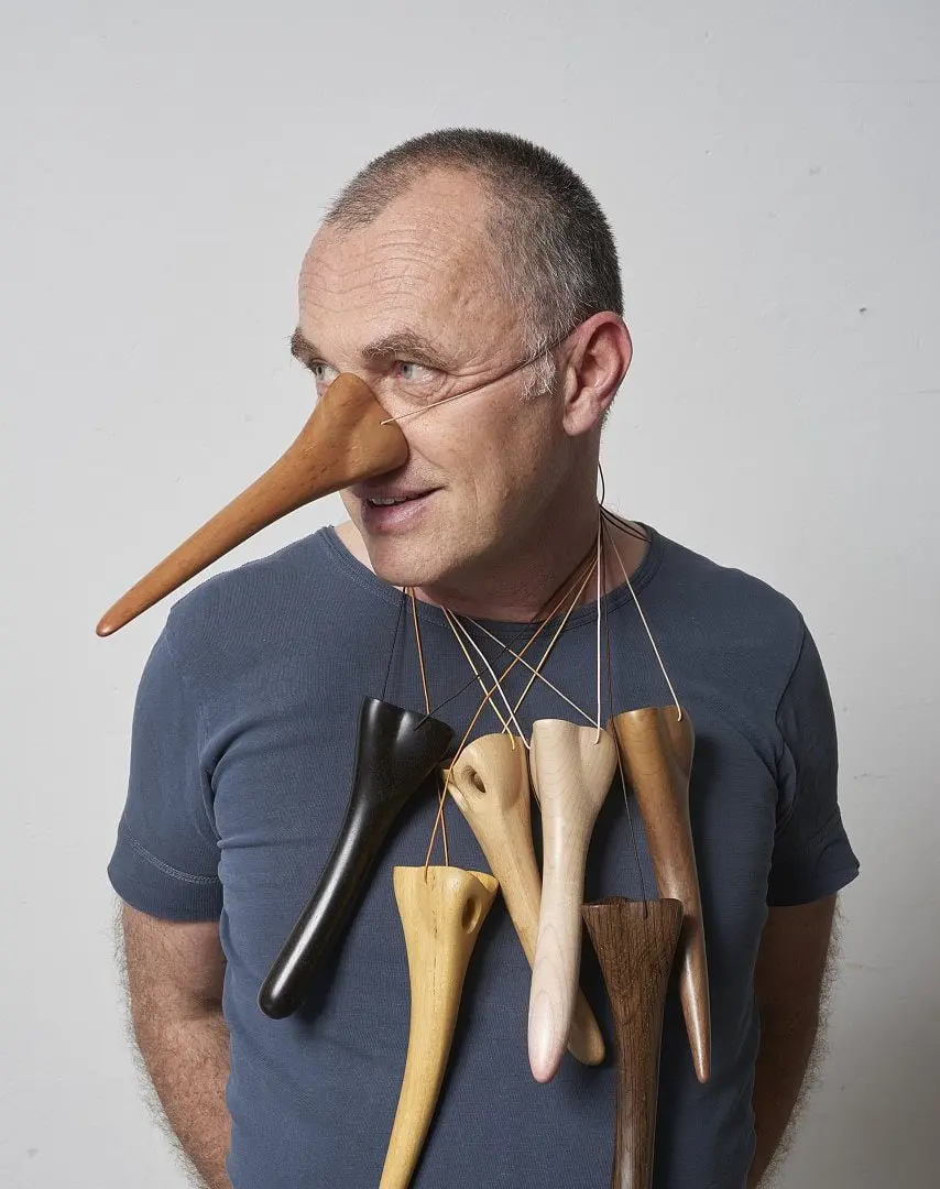 Portrait of David Bielander Wearing His Pinocchio Necklaces, 2020, carved and waxed assorted wood, some from a confessional, photo: Center for Art in Wood